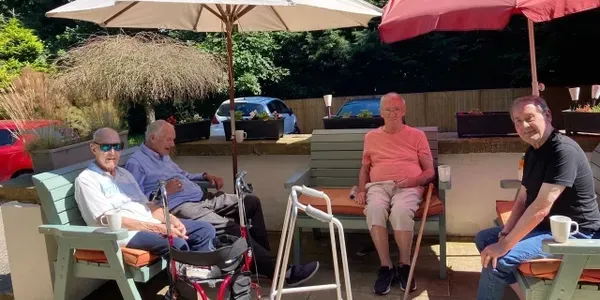 Residents enjoying the garden at Springfield House